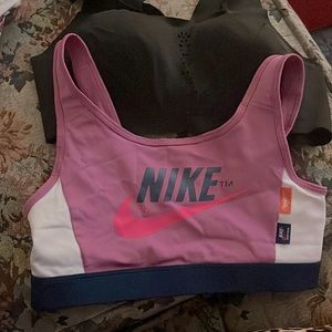 2 sports bras. Nike brand size M and Victoria Secret 34C